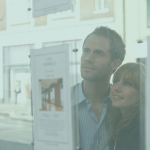 Couple looking through window of estate agents. Residential conveyancing solicitors wsp solicitors first time buyers