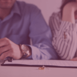 Couple sorting out their divorce at solicitor's office